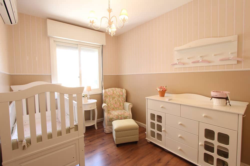 Baby Room with crib changing table and chair